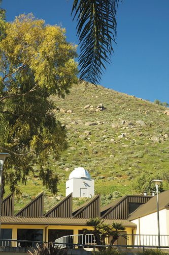 The white-domed Barnard Observatory is situated behind the Visual Art Center on the slope of Mount Two Bit.
