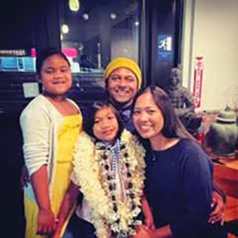 Iki Taimi with his family (left to right) Mikayla, Lio, and Melanie.