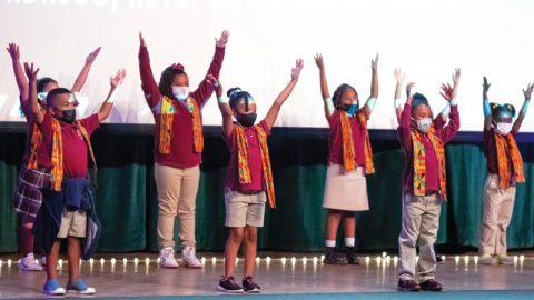 Students sign to “Lift Every Voice and Sing.”