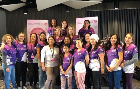 Women from several of the NUC Hispanic churches sport the event soccer shirts, with the theme in Spanish on the front and English on the back. 