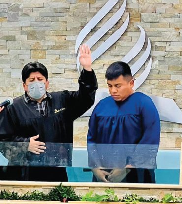 Pastor Jeffery Guerrero baptizes a new member into the Phoenix North Valley Spanish church.