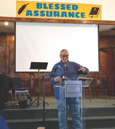 Hermus Poor Thunder teaches Sabbath School during camp meeting.