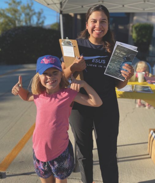 Francis, Full Circle coordinator, involves a young church member at a free car wash.