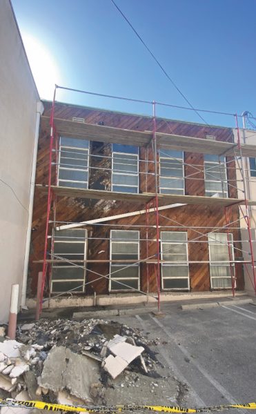 Water damage prompted repair work such as replacing wood, treating mold, and a roof redesign.