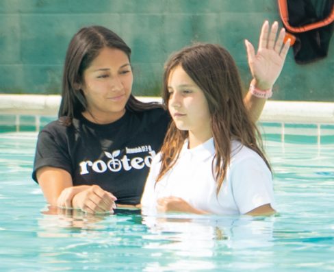 Montenegro baptizes Anabelle Kelly.