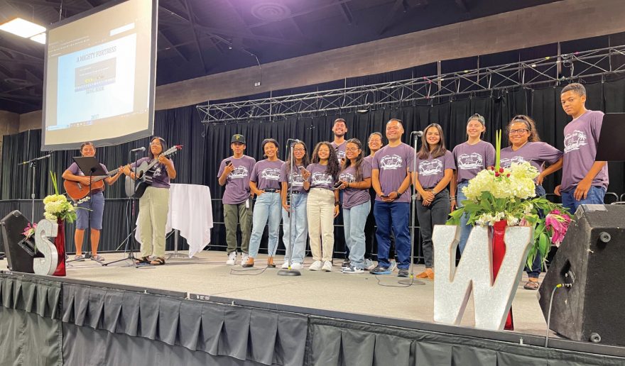 SCC student evangelists gather on stage at the iShare Conference, the culmination of the summer for all Youth Rush participants in the Pacific Union.