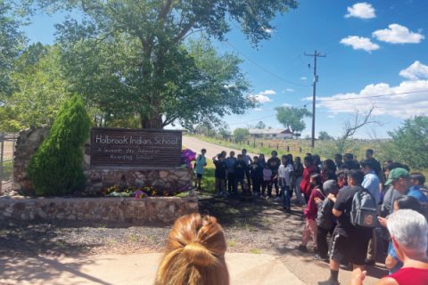 The students that remained on campus gathered with staff at our school gate on Monday following the accident to see flowers and balloons left by our Holbrook community neighbors.