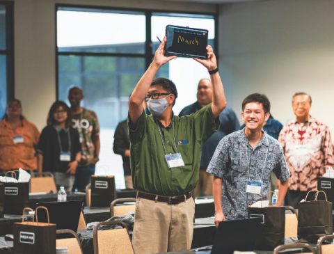 Benjamin Bunag gets creative as attendees organize themselves by birth month.