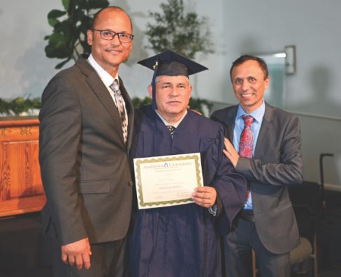 Gonzalez (left) and Heras (right) are pictured with Jhon Ruge (center), member of El Sereno Spanish church.