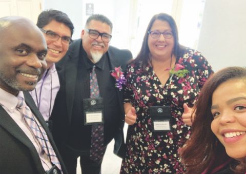 Newly re-elected officers, from left to right: Oneil Madden, regional coordinator; Benjamin Carballo, Hispanic coordinator; Carlos Camacho, president; Karen Schneider, treasurer; and Chanda Nunes-Henry, executive secretary.