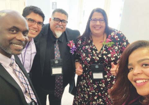 Newly re-elected officers, from left to right: Oneil Madden, regional coordinator; Benjamin Carballo, Hispanic coordinator; Carlos Camacho, president; Karen Schneider, treasurer; and Chanda Nunes-Henry, executive secretary.