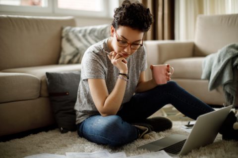 Young woman working at home