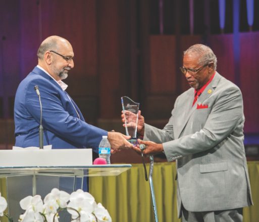 AHWM President John Raffoul presents the Christian Service Award to Chaplain James Patterson during Hospital Sabbath.