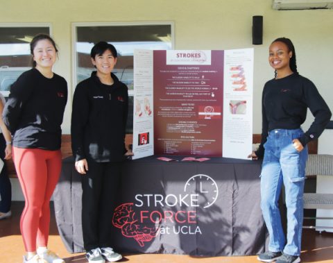 Students from UCLA pose at their booth before educating attendees about stroke signs, symptoms, and risk factors.