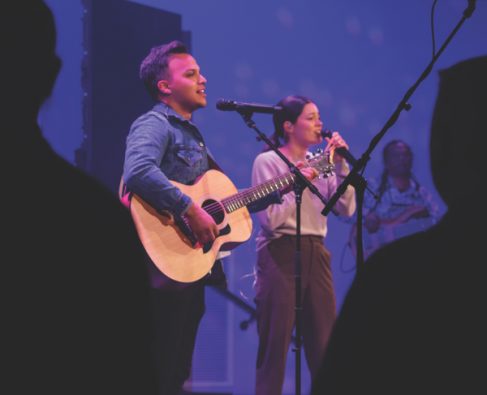 Jo Amaya and Laia Amaya worship with song.