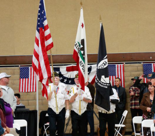 Veterans prepare for flag salute.