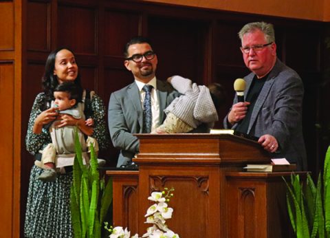 Marco and his family are introduced to the congregation by West Region Director Greg Hoenes