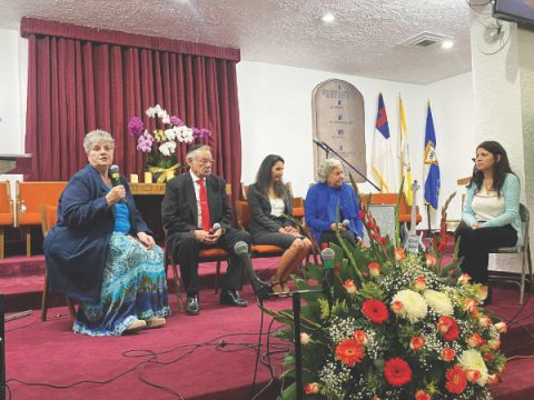 Longtime members review the congregation’s history and purchase of the sanctuary. (Left to right) Arline Ordoñez, Manuel Rodríguez, Rocio and Angelita Pulido, and Jannette R. Trance. 