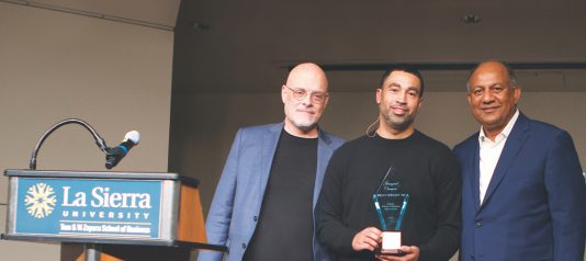 Left to right, Zapara School of Business Associate Dean Gary Chartier, San Antonio Spurs General Manager Brian Wright, and business school dean John Thomas.