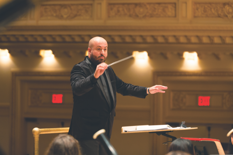Giovanni Santos leads the La Sierra University Wind Ensemble in a 2018 performance at New York City’s Carnegie Hall.<br />Giovanni Santos dirige el grupo de viento de La Sierra University Wind Ensemble en una presentación en 2018 en el Carnegie Hall de New York City.