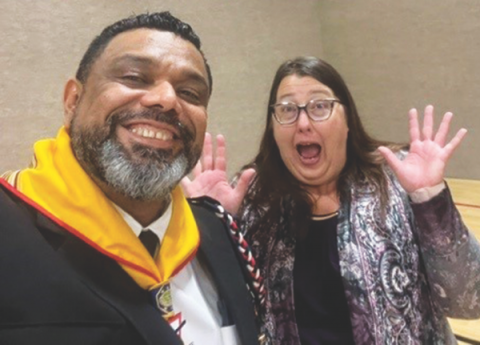 NUC Youth Director Rudy Alvir shares with NUC Treasurer Karen Schneider the blessing that comes from working with our young people.
