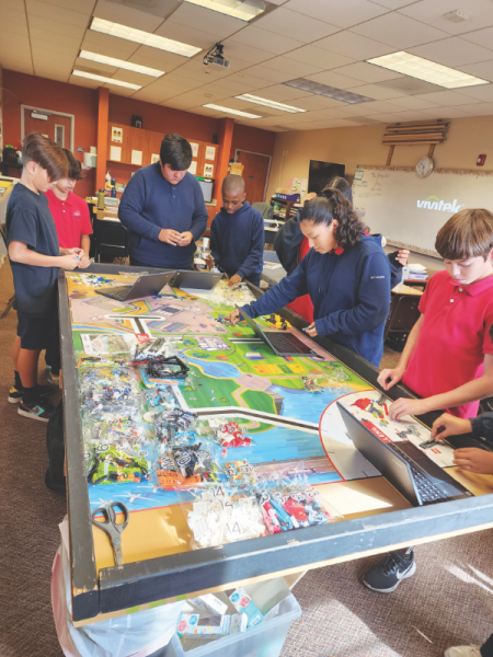 The LNJA Robotics team is hard at work.